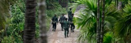 Myanmar army walking on the road through jungle. Credit: UN