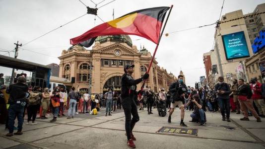 Photo of Aboriginal protest in Melbourne. Getty Images
