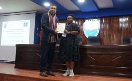 Photo of Timorese Ombudsman and Jennifer Ligo, participant in 32nd Annual Human Rights Peoples' Diplomacy Training Program. Credit: DTP
