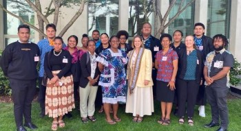Pacific Voices for Climate Change Fellows with Hon. Kate Thwaites in Parliament House courtyard. Credit: Kate Thwaites