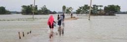 People walking across flooded plains. Credit: OHCHR. Credit: Free Rohingya Coalition