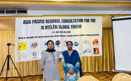 Misses Lubna and Rahat in front of banner attending Asia Pacific Regional Consultation for the third NYELENI Global Forum in Sri Lanka. Credit: Rufus Kamran 