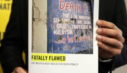 Amnesty International report calling for Malaysia to abolish the death penalty. Credit: AFP via Getty Images