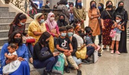 Malaysian mothers wait at the Court of Appeal in Putrajaya for a verdict in their lawsuit seeking the right to citizenship for their children, who were born overseas to foreign fathers, Aug. 5, 2022. Credit: S. Mahfuz/BenarNews
