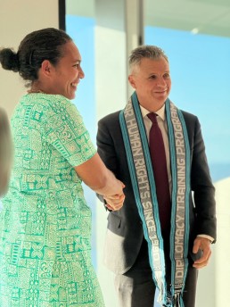 Melaia Kubuabola presents the Hon. Matt Thistlethwaite with a DTP tais at the Pacific Voices on Climate Change reception at Corrs. Credit: Miriam Moriati