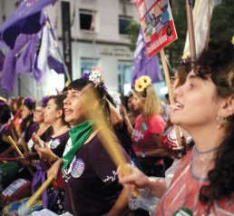 Cover image of the OHCHR Human rights Report. People take part in a demonstration for International Women’s Day in Sao Paulo, Brazil, on  8 March 2023. © Cris Faga via Reuters Connect 