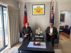 Photo of Aung Myo Min and Patrick Earle seated in the NUG offices in Canberra. Credit: DTP