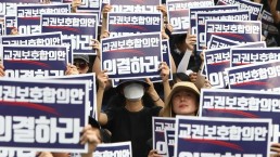 Protest in Republic of Korea on the increasing rates of suicide. Chung Sung-Jun/Getty Images