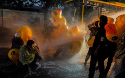 Demonstrators use inflatable rubber ducks as shields to protect themselves from water cannons during an anti-government protest as lawmakers debate on constitution change, outside the parliament in Bangkok, Thailand, on Tuesday(Reuters/Athit Perawongmetha)  This article was published in thejakartapost.com with the title "[INSIGHT] Women and youth targets of COVID-19 authoritarianism in SE Asia". Click to read: https://www.thejakartapost.com/paper/2020/12/09/insight-women-and-youth-targets-of-covid-19-authoritarianism-in-se-asia.html?fbclid=IwAR0N9F8GzTP8qVTPcEZaFa8Nwy2qeC-UPxmJIqQNQdbdwrZhIl6_PS2eY2c.   Download The Jakarta Post app for easier and faster news access: Android: http://bit.ly/tjp-android iOS: http://bit.ly/tjp-ios