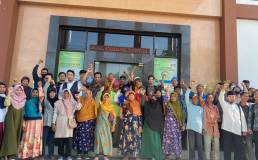 Members of the community of Nguter Distric, Sukoharjo Regency, Central Java, Indonesia outside Supreme Court hands raised after court win. Credit: Eti Oktaviani