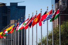 View of world flags outside UN Headquarters. Credit: UN Photo/Rick Bajornas