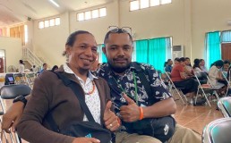 Vidal Campos Magno and Samuel Womsiwor at climate conference. Credit: Vidal Campos Magno