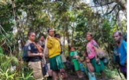 People standing in West Papuan jungle