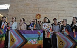 Thai LGBTQI+ activists campaigning with LGBTQI+ flags. Credit: Fortify Rights
