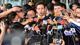 Former Thai prime ministerial candidate and ex-Move Forward Party leader Pita Limjaroenrat (C) speaks to the media outside the Constitutional Court in Bangkok on January 24, 2024, after the court decided to reinstate him as a lawmaker. Credit: Manan Vatsyayana/AFP/Getty Images