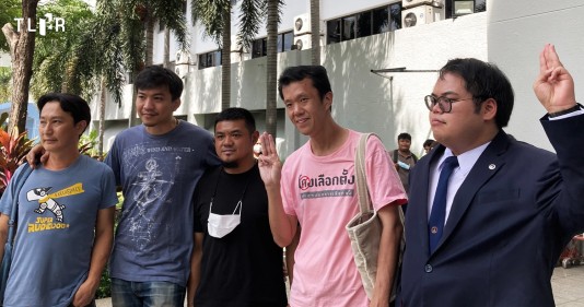 Thai pro-democracy activists Ekachai Hongkangwan, Boonkueanun Paothong, Suranat Paenprasert, and two others outside court. Credit: Thai Lawyers for Human Rights
